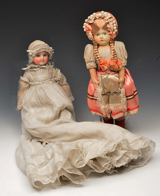 Appraisal: AN OLD CONTINENTAL DOLL with bisque head and composite body