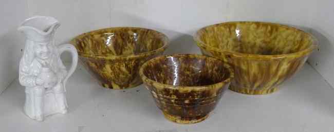 Appraisal: Lot three th c graduated Rockingham bowls '' '' ''