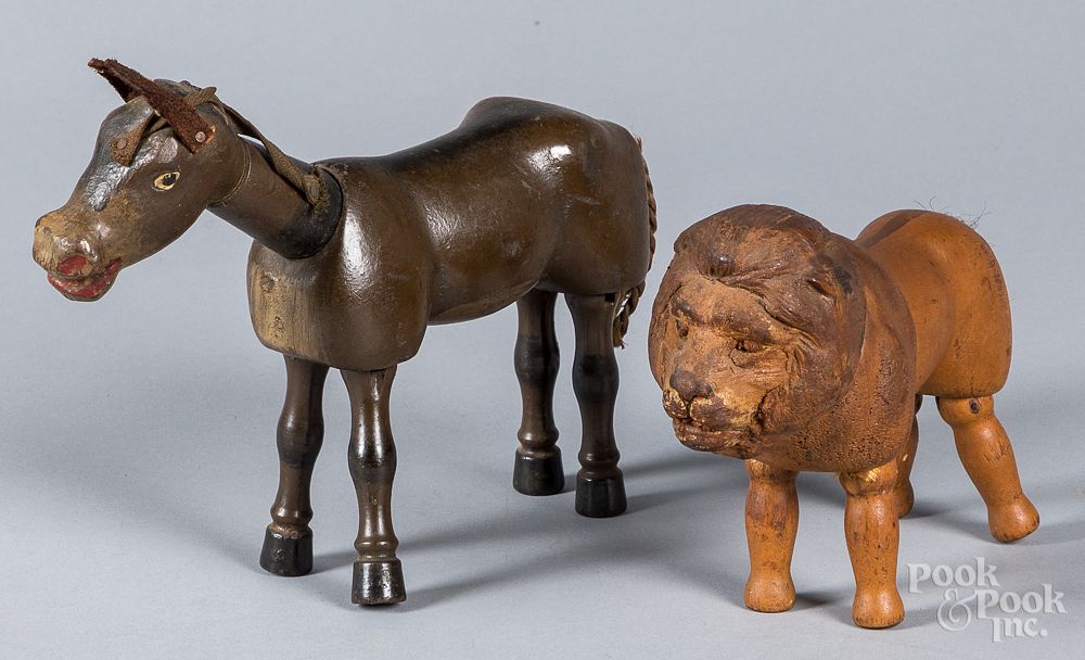 Appraisal: Schoenhut donkey and lion Schoenhut donkey and lion with painted