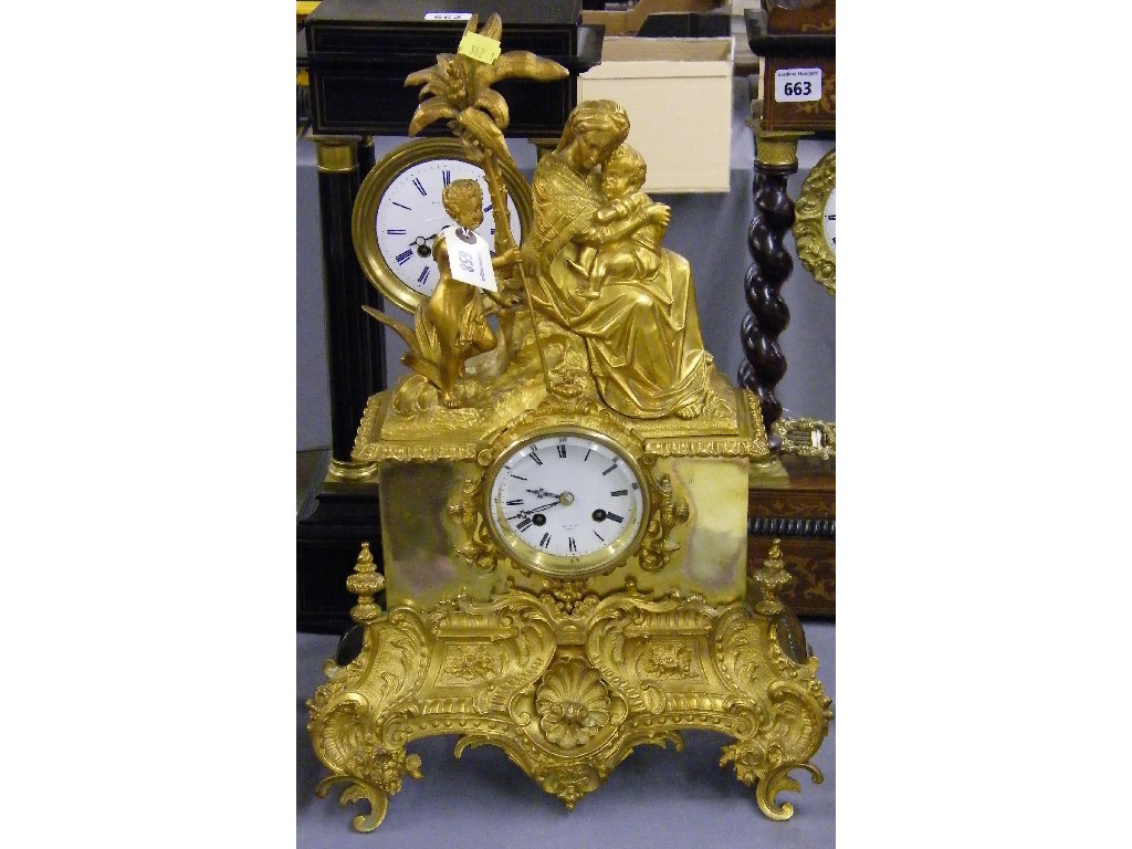 Appraisal: French gilded metal two train figural mantel clock the Japy