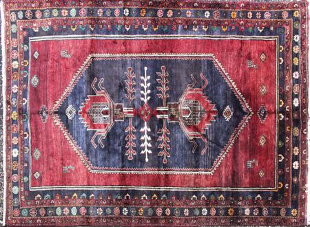 Appraisal: A Shiraz rug late th century the burgundy field with