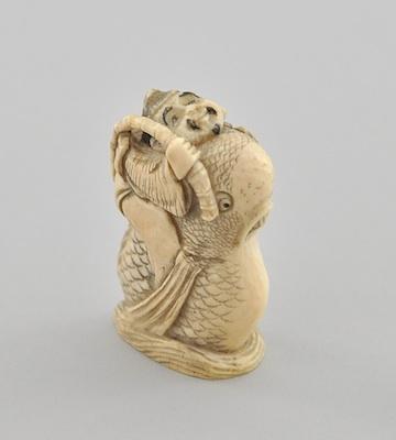 Appraisal: Ebisu Saburo Riding Whale Ivory Netsuke The carved figure of