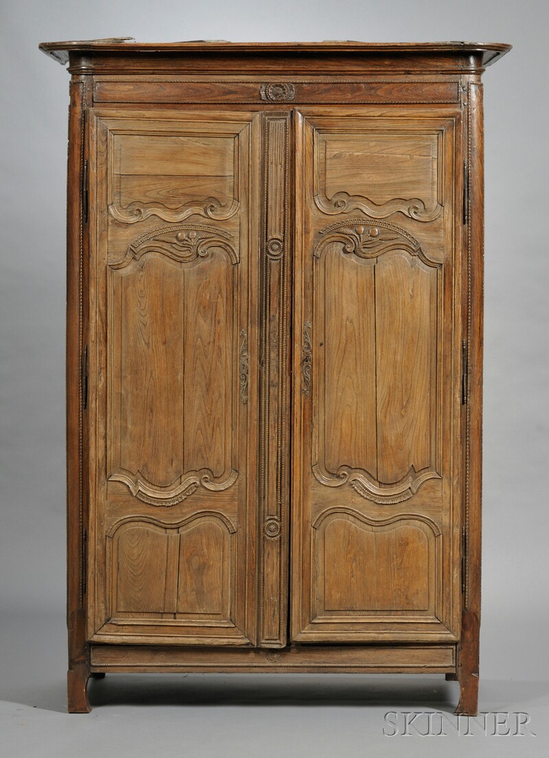 Appraisal: Provincial Louis XV Armoire France late th century doors with