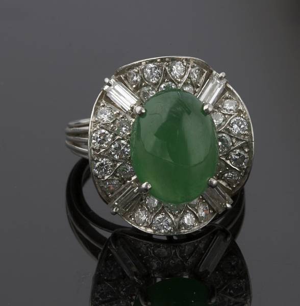 Appraisal: A natural jadeite jade and diamond ring centering an oval