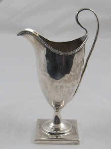 Appraisal: A helmet shaped silver cream jug by Hester Bateman hallmarked