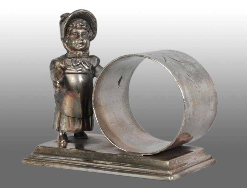 Appraisal: Kate Greenaway Girl Figural Napkin Ring Description Marked Simpson Hall