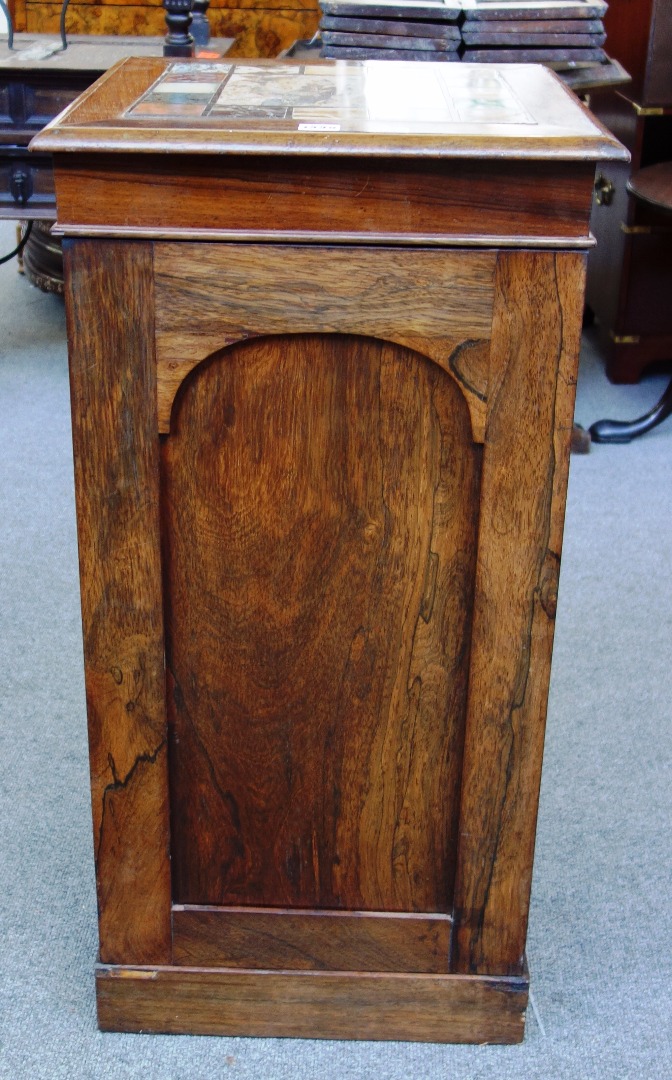 Appraisal: A th century and later rosewood pedestal cupboard with inset