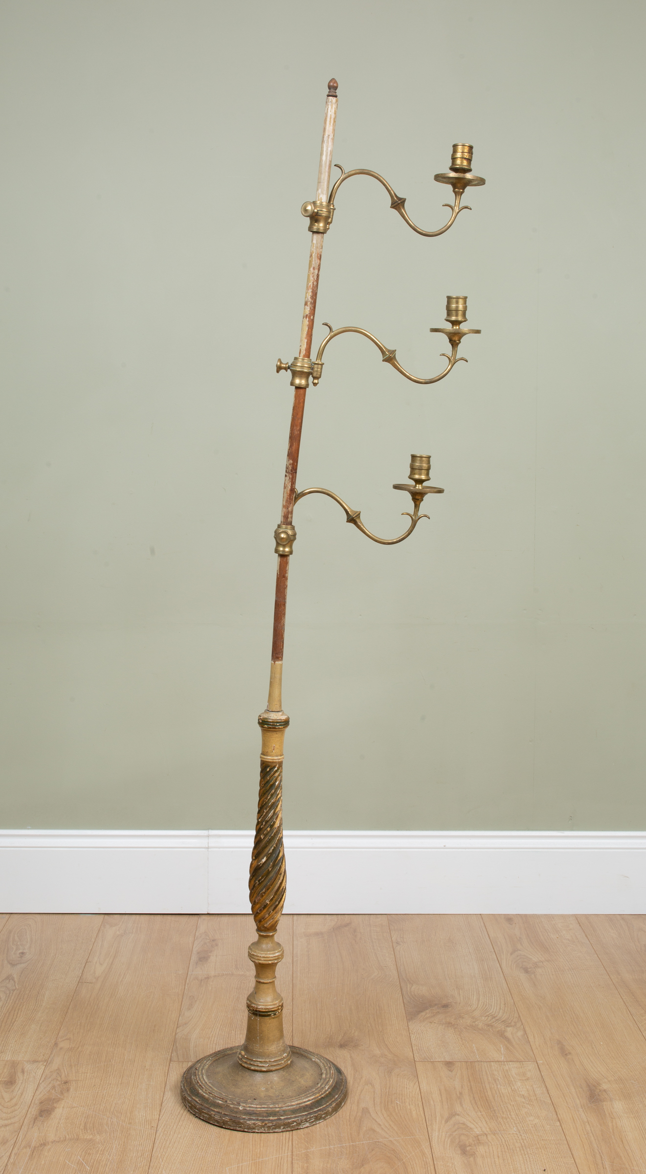 Appraisal: A th century painted wooden floor standing candle stand with