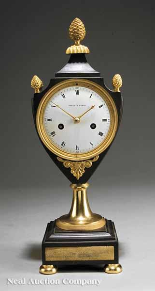 Appraisal: A Louis XVI-Style Gilt and Patinated Mantel Clock th c