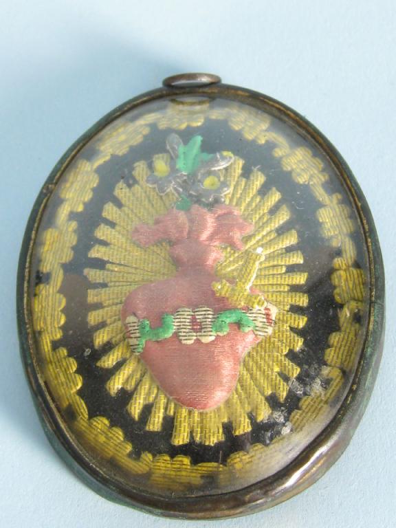 Appraisal: A th Century oval needlework Love Token embroidered with sword