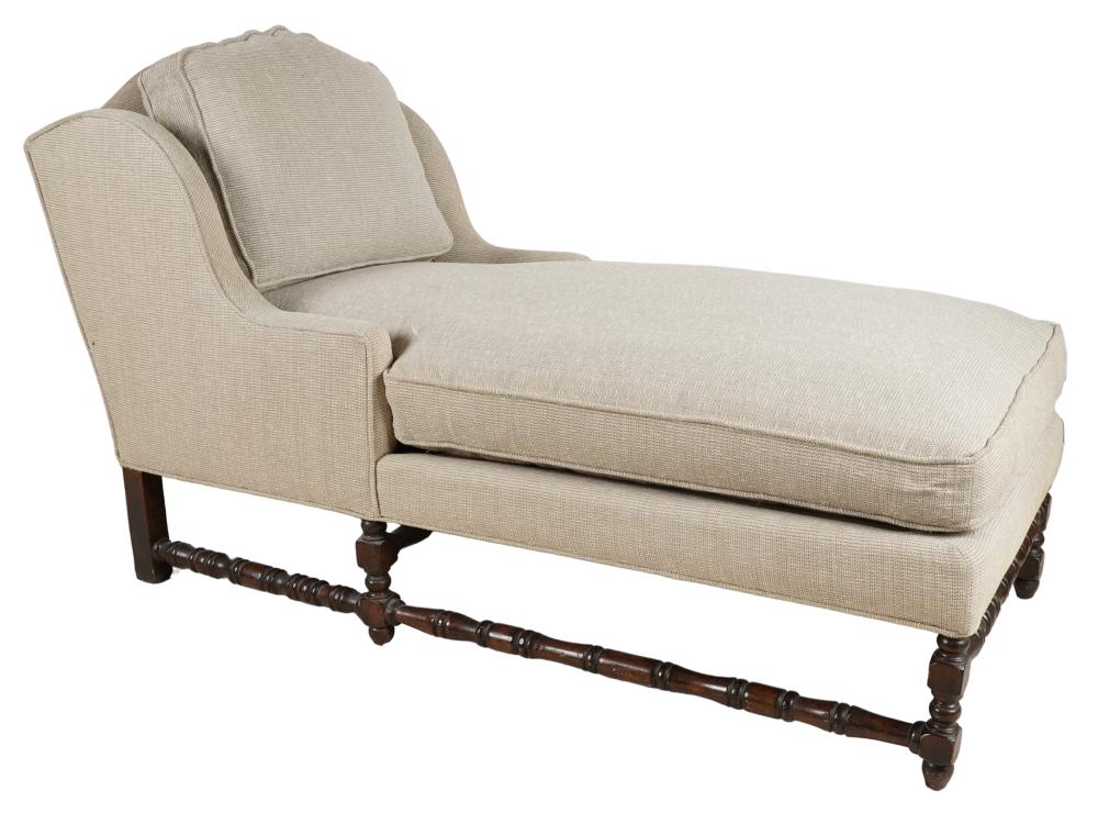 Appraisal: BEIGE UPHOLSTERED CHAISE LOUNGErests on an English style wood base