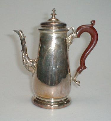 Appraisal: A modern silver coffee pot of George Ii design the