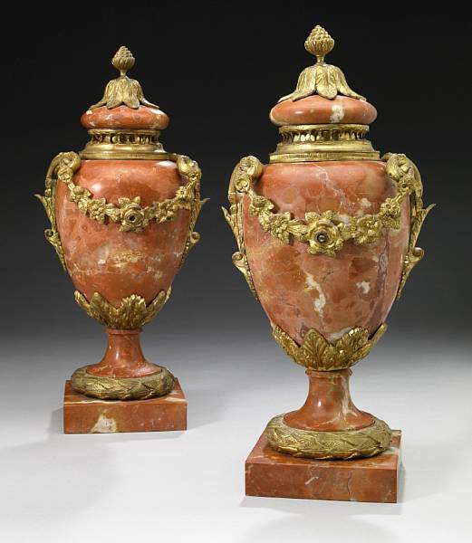 Appraisal: A pair of Louis XVI style gilt bronze mounted variegated