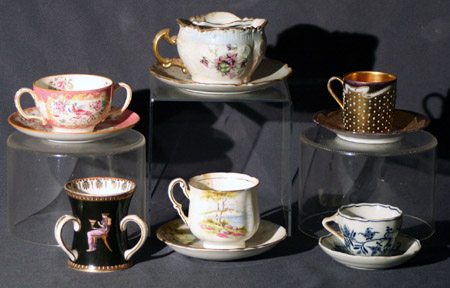 Appraisal: Collection of European Porcelain Cups Saucers and Table Articles Late