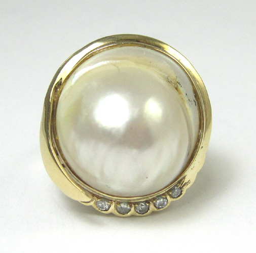 Appraisal: MABE PEARL AND DIAMOND RING k yellow gold with seven