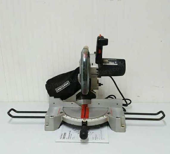 Appraisal: Sears Craftsman model miter saw with added accessories includes owners