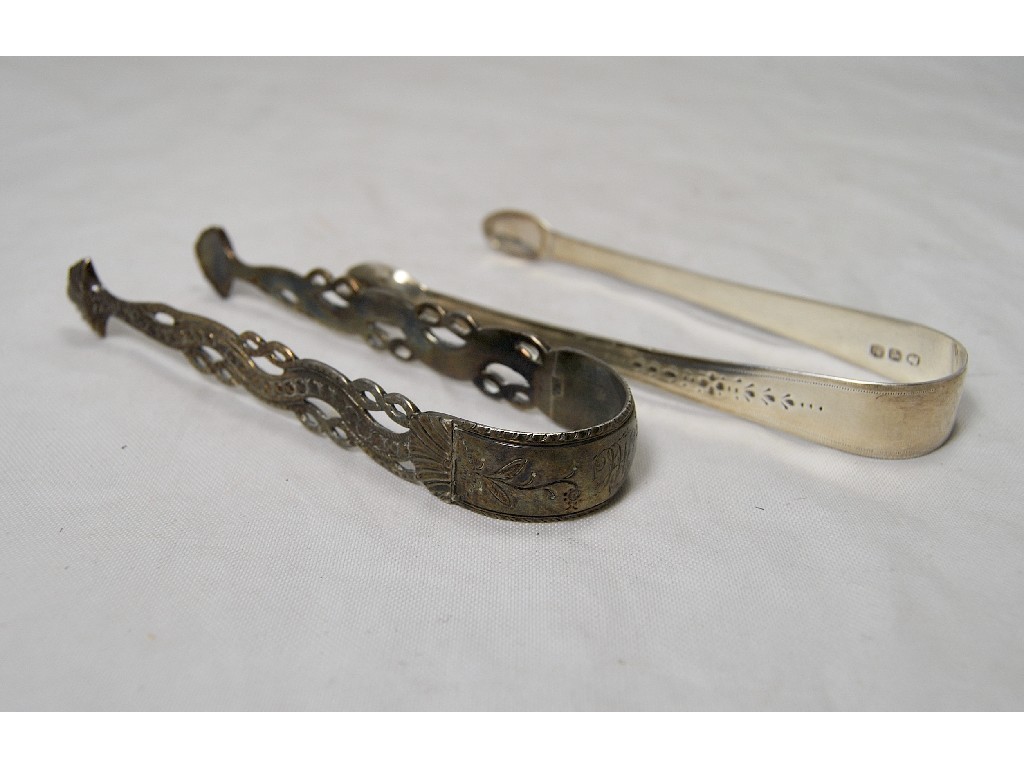 Appraisal: Pair of silver cast Georgian sugar tongs maker WS to