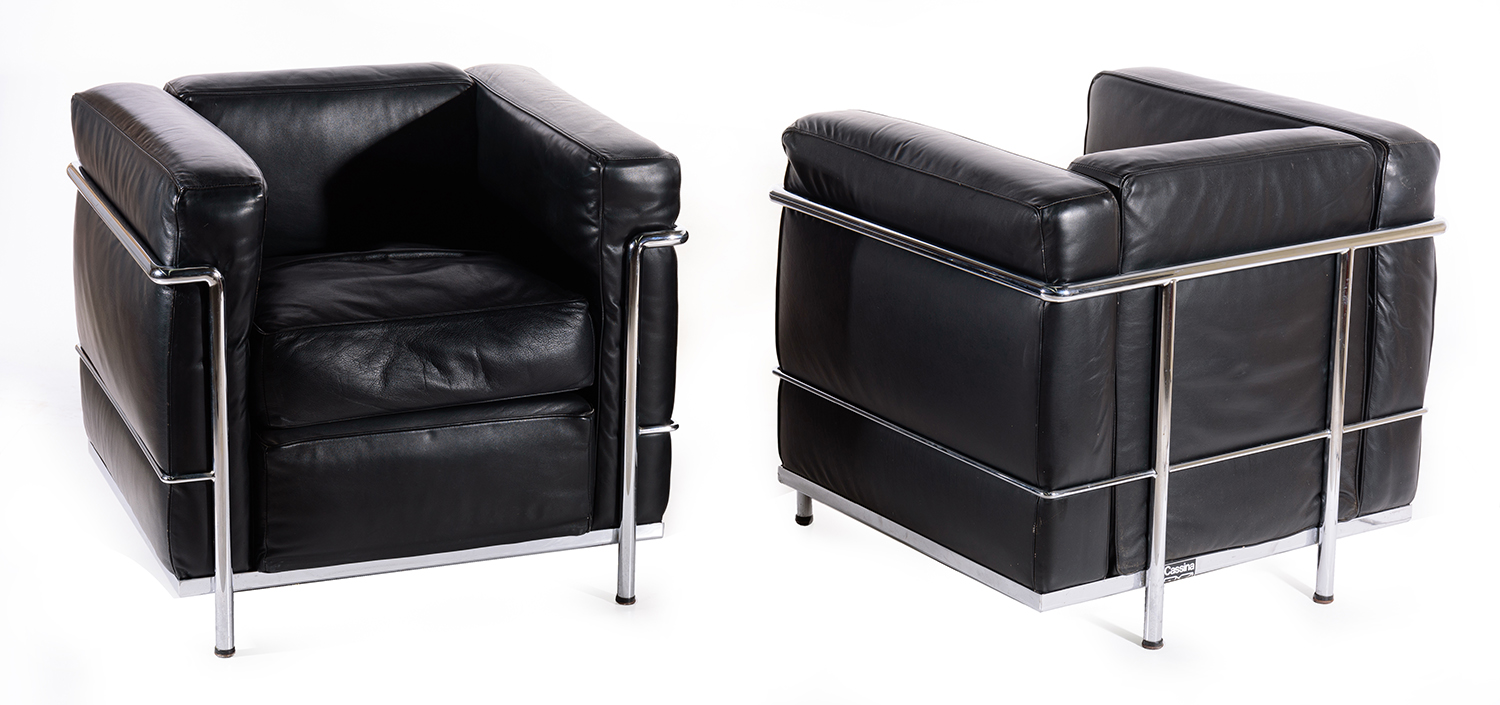 Appraisal: PAIR OF CHAIRS IN THE STYLE OF LE CORBUSIER Black