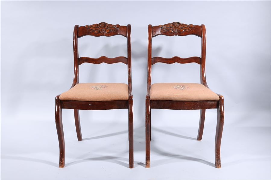 Appraisal: Pair of vintage carved wood chairs each black splat with