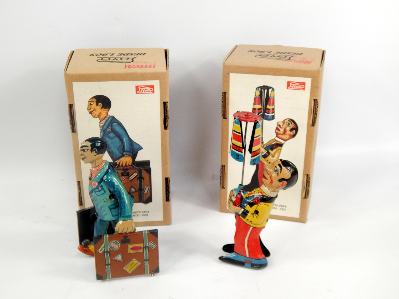 Appraisal: Jaya tin plate toys comprising a gentleman with suitcase and