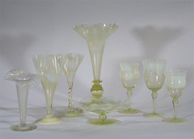 Appraisal: A collection of vaseline glass comprising a floriform vase three