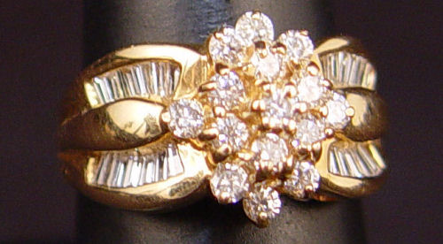 Appraisal: CONTEMPORARY DIAMOND RING K yellow gold ring contains round brilliant