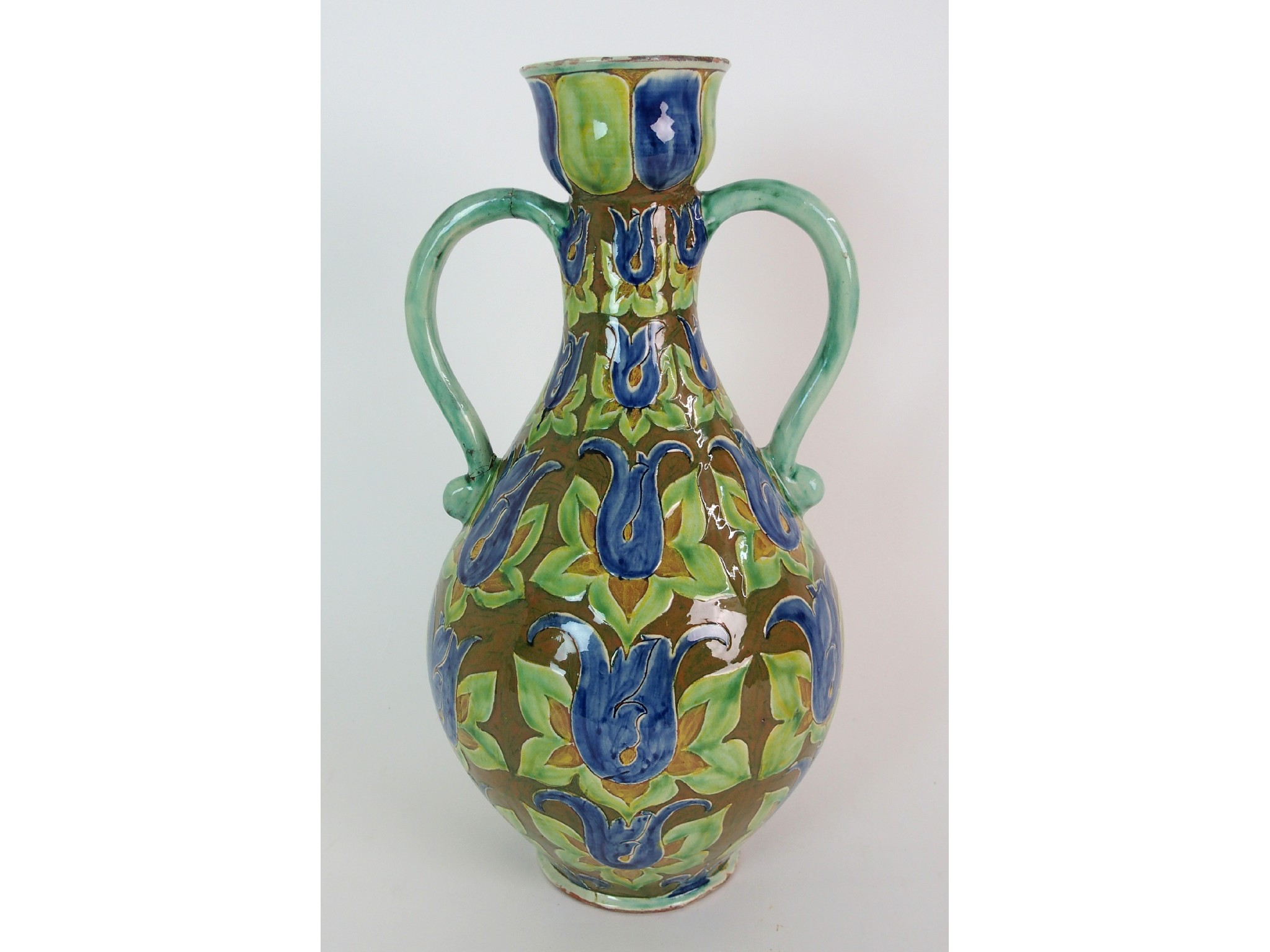 Appraisal: A Della Robbia Pottery Art Nouveau vasecirca elongated ovoid-form with