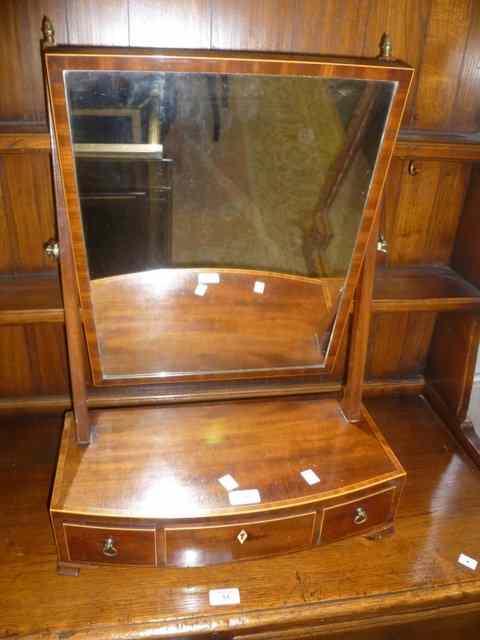 Appraisal: A GEORGIAN MAHOGANY DRESSING TABLE MIRROR on square taper supports