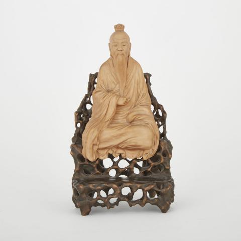 Appraisal: A Boxwood Carving of an Immortal Finely carved with a