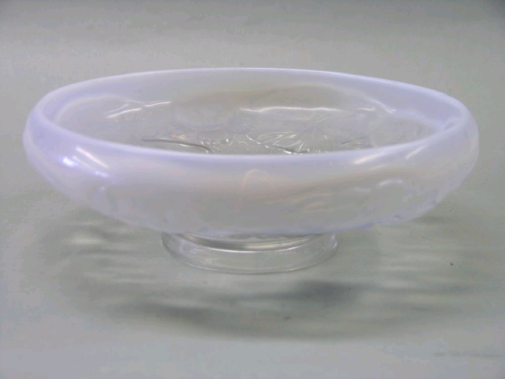 Appraisal: A Lalique-style opalescent glass fruit bowl pressed with a floral