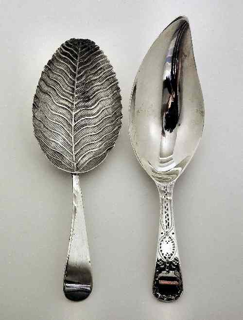 Appraisal: A George III silver caddy spoon with embossed leaf pattern