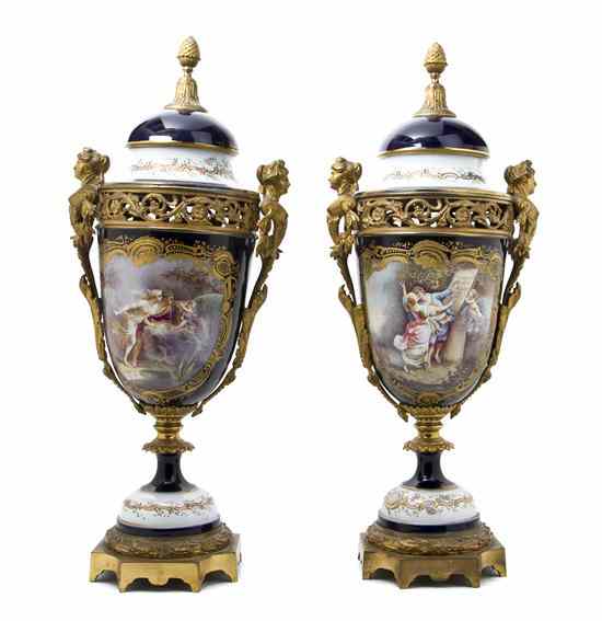 Appraisal: A Pair of Gilt Bronze Mounted Sevres Style Covered Urns