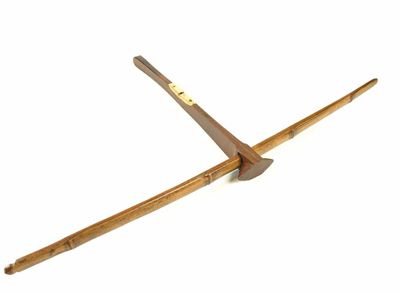 Appraisal: An Indonesian crossbow with incised decoration and bone mounts in