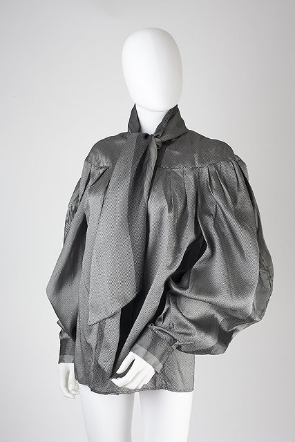 Appraisal: An Alexander McQueen grey silk blouse with attached neck tie