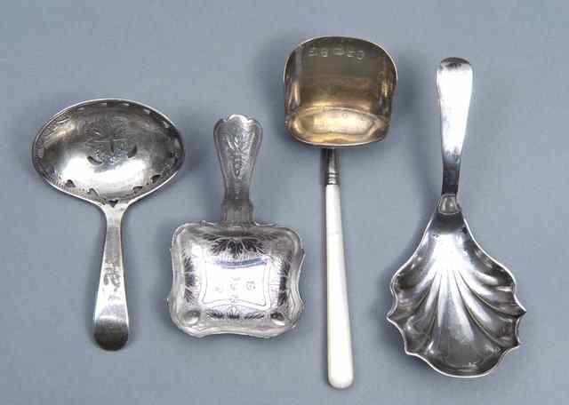 Appraisal: A GEORGE III SILVER CADDY SPOON with oval bowl engraved