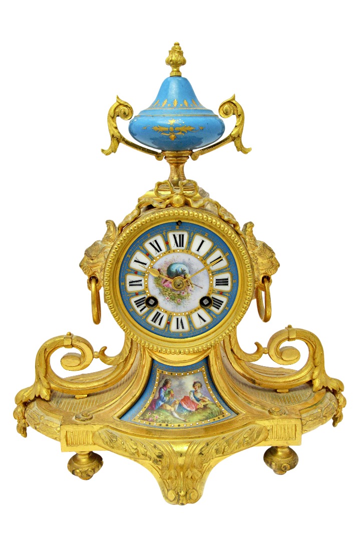 Appraisal: A French ormolu and porcelain mantel clock of Louis XVI