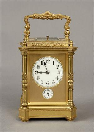 Appraisal: French Gilt-Brass Carriage Clock With repeat alarm and double-gong strike