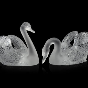 Appraisal: A Pair of Lalique Cygnes Sculptures Second Half th Century