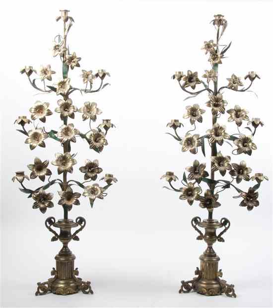 Appraisal: A Pair of Victorian Brass Candelabra the floral standard set