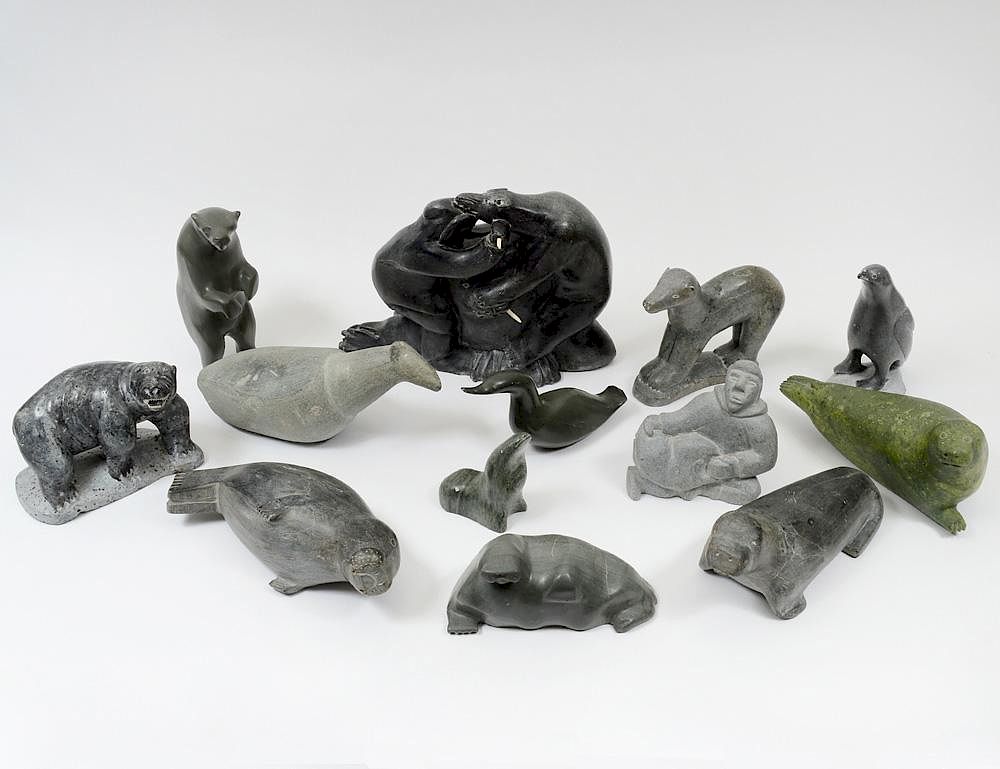 Appraisal: GROUP OF THIRTEEN NATIVE INUIT STONE CARVINGS Comprising Walrus by