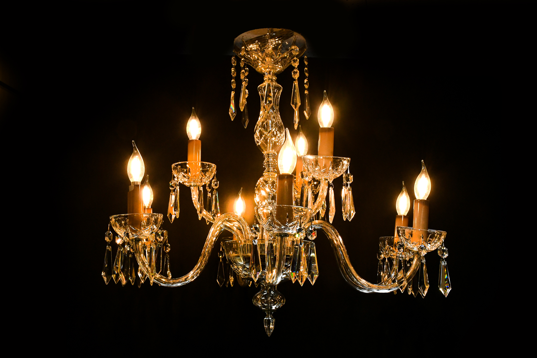 Appraisal: -LIGHT WATERFORD CRYSTAL CHANDELIER Having scrolling arms that terminate with