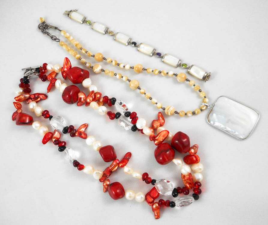 Appraisal: THREE ARTICLES OF JEWELRY including a double strand necklace strung