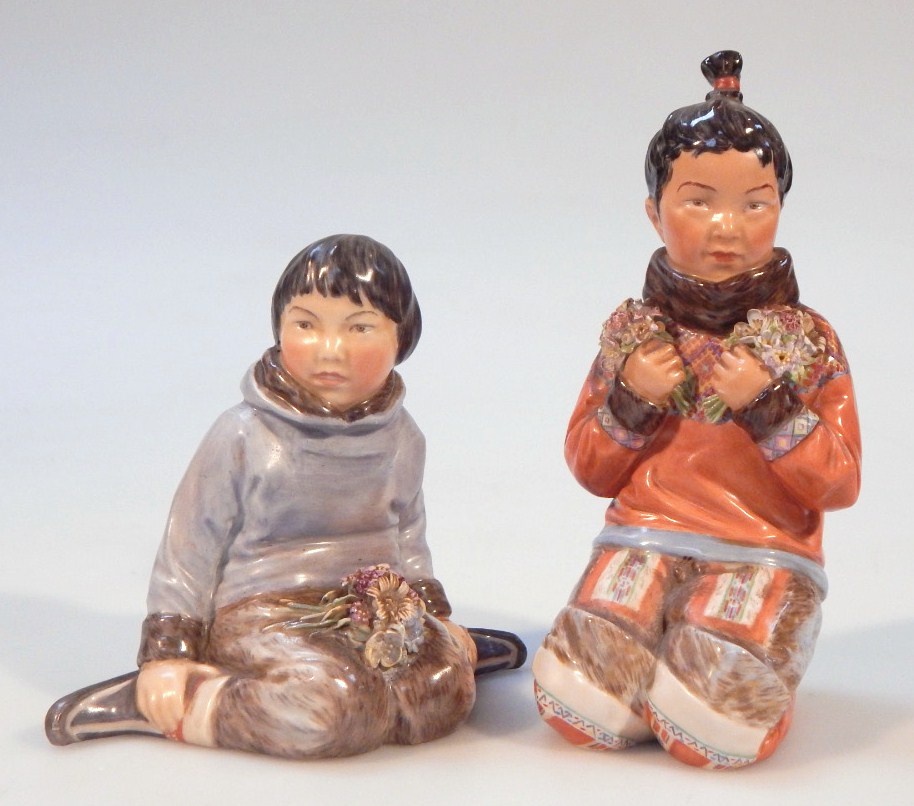 Appraisal: Two Royal Copenhagen Granland figures the first figure kneeling with