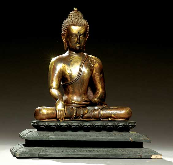 Appraisal: GILT BRONZE BUDDHA Nepalese gilt bronze model of Shakyamuni Buddha