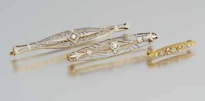 Appraisal: Three Art Deco Gold Brooches Including two filigree brooches set