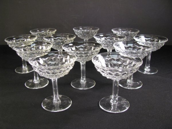 Appraisal: Twelve Fostoria American clear stem tall champagne or sherbet glasses