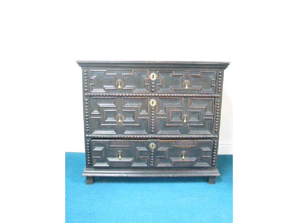 Appraisal: A th Century oak Chest of three drawers with moulded