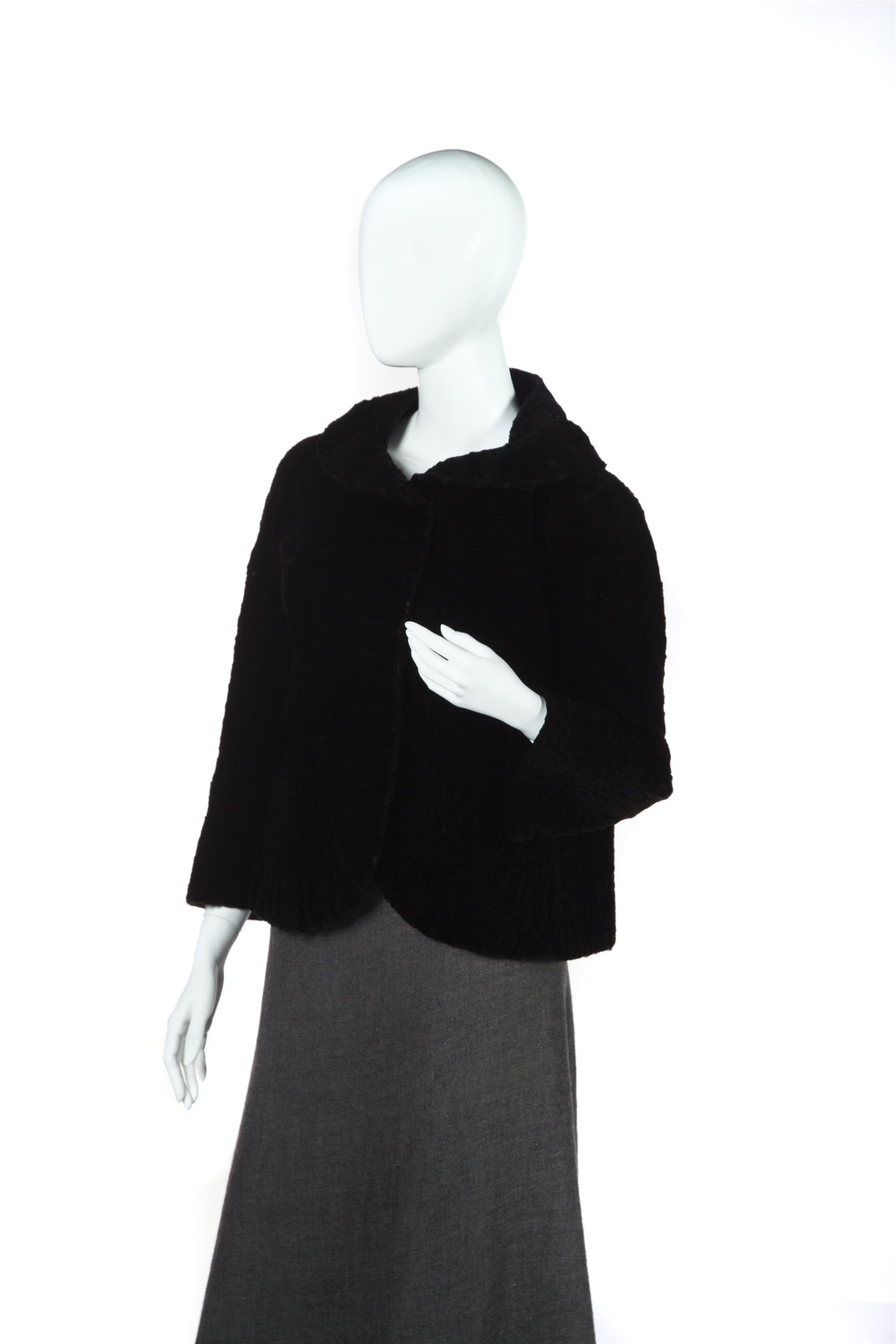 Appraisal: BLACK PERSIAN LAMB CAPE STYLE JACKET Mid- th century Short