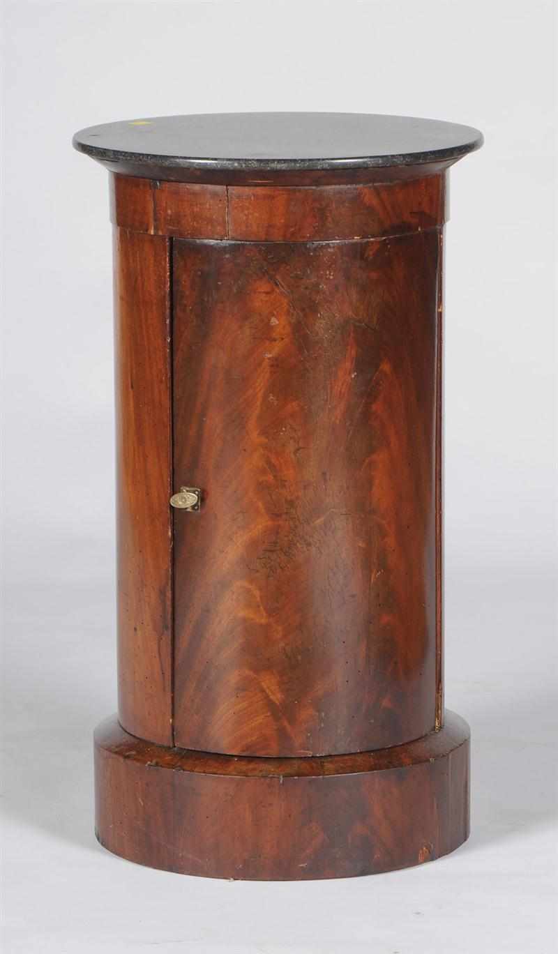 Appraisal: ENGLISH PROVINCIAL FLAME MAHOGANY PEDESTAL POT CUPBOARD The circular speckled