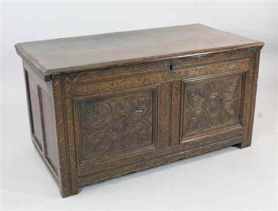 Appraisal: An early th century oak coffer with later carved floral